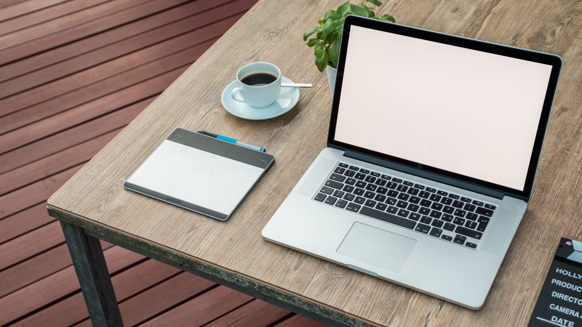 Computer with coffee cup, rebranding image