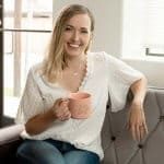 Woman sitting on couch for marketing meeting